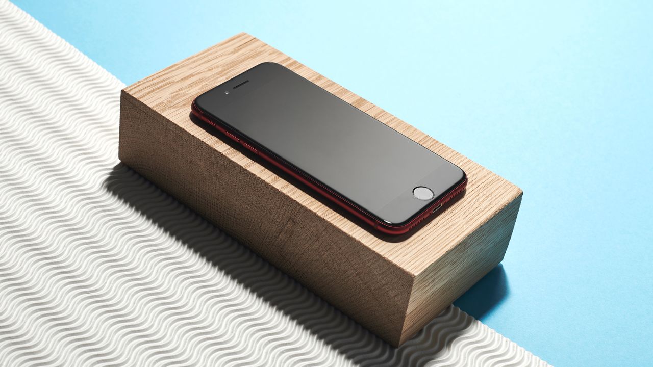 An Apple iPhone SE smartphone is seen on August 5, 2020.